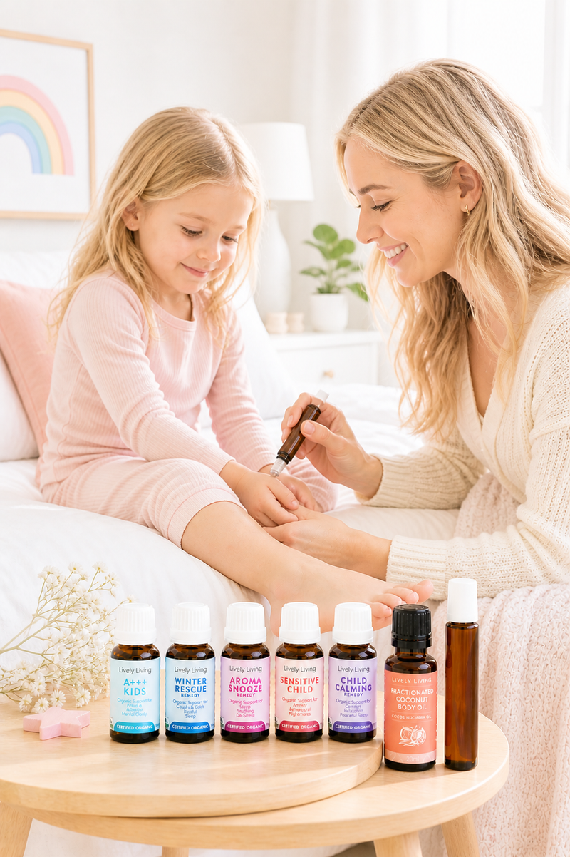 Woman and child with essential oil bottles on a table