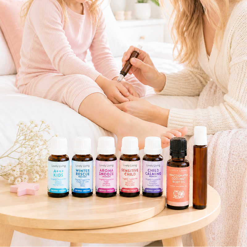 Woman and child with essential oil bottles on a table