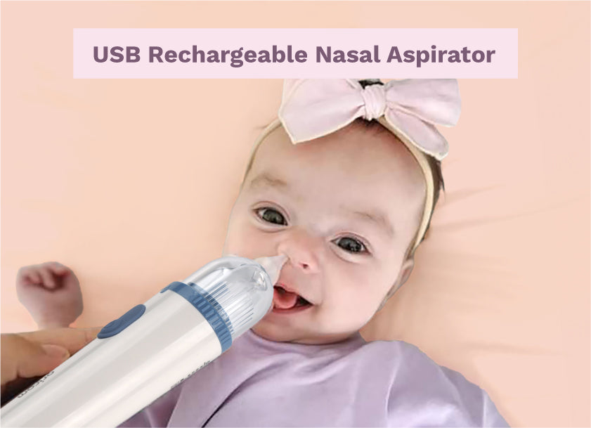 Smiling baby girl with a pink bow and the USB rechargeable nasal aspirator