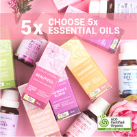 Lively Living certified organic essential oils and boxes on a pink background, including Beautiful, Women's Blend, Harmony, Anxiety Aid, Sensitive Child, Winter Rescue and Organic Lavender, with a banner reading 5x Choose 5x Essential Oils and the ACO Certified Organic logo