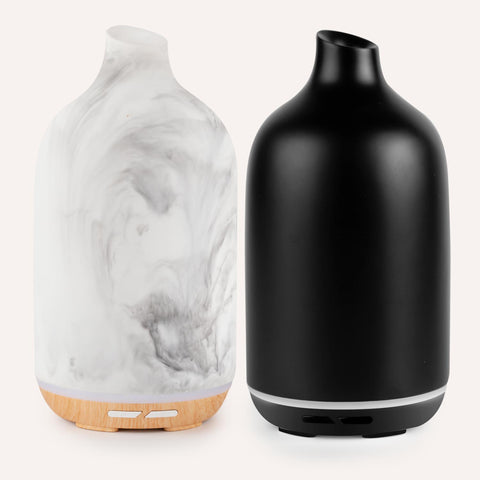 Two diffusers grey and black side by side 