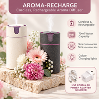 Aroma-Recharge Cordless Diffuser in cream and charcoal releasing mist among pink flowers, with icons for cordless and rechargeable, 70ml water capacity, up to 5 hours of mist and colour changing lights, plus USB cord and AU power adapter included