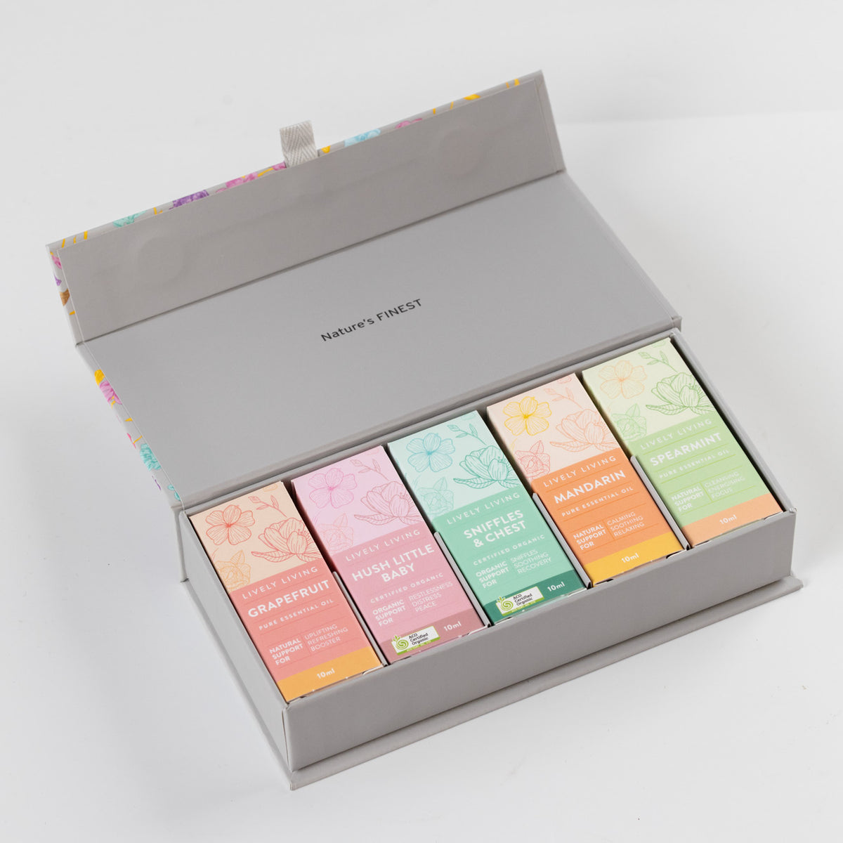 Lively Living Baby Wellbeing Essential Oils in a grey decorative box on a white background