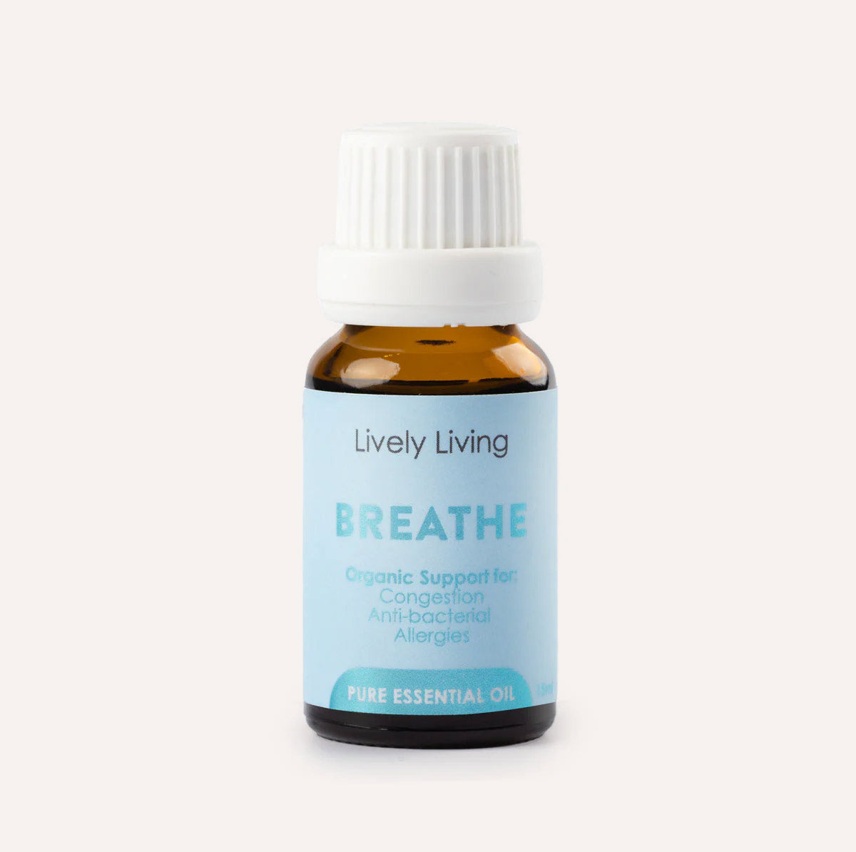 Bottle of Lively Living Breathe essential oil on a white background