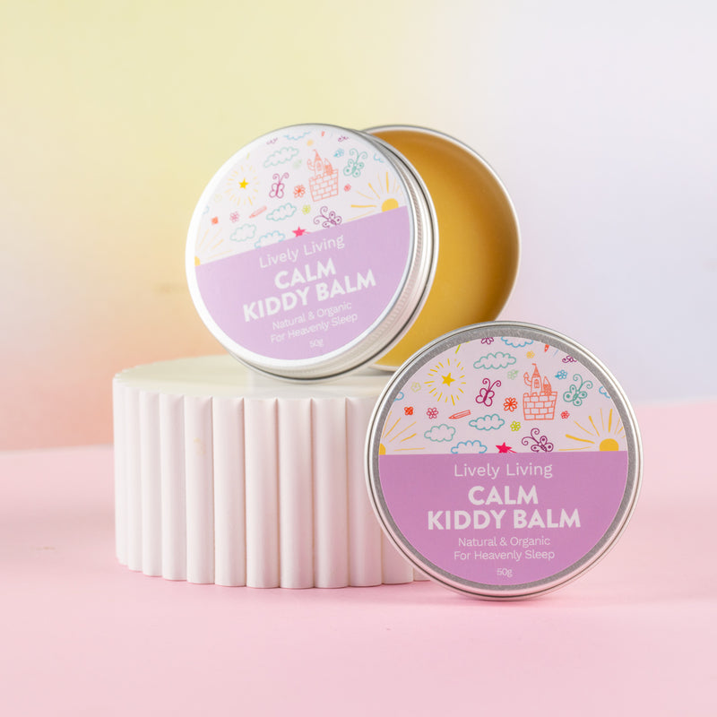 Two containers of Calm Kiddy Balm with one displaying the balm inside