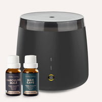 Black diffuser with two bottles of Lively Living essential oils on a white background
