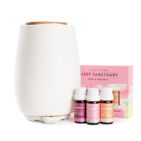 Lively Living White Aroma Fern Ceramic diffuser with  Serenity. Sleep and Mandarin essential oil bottles and packaging on a white background