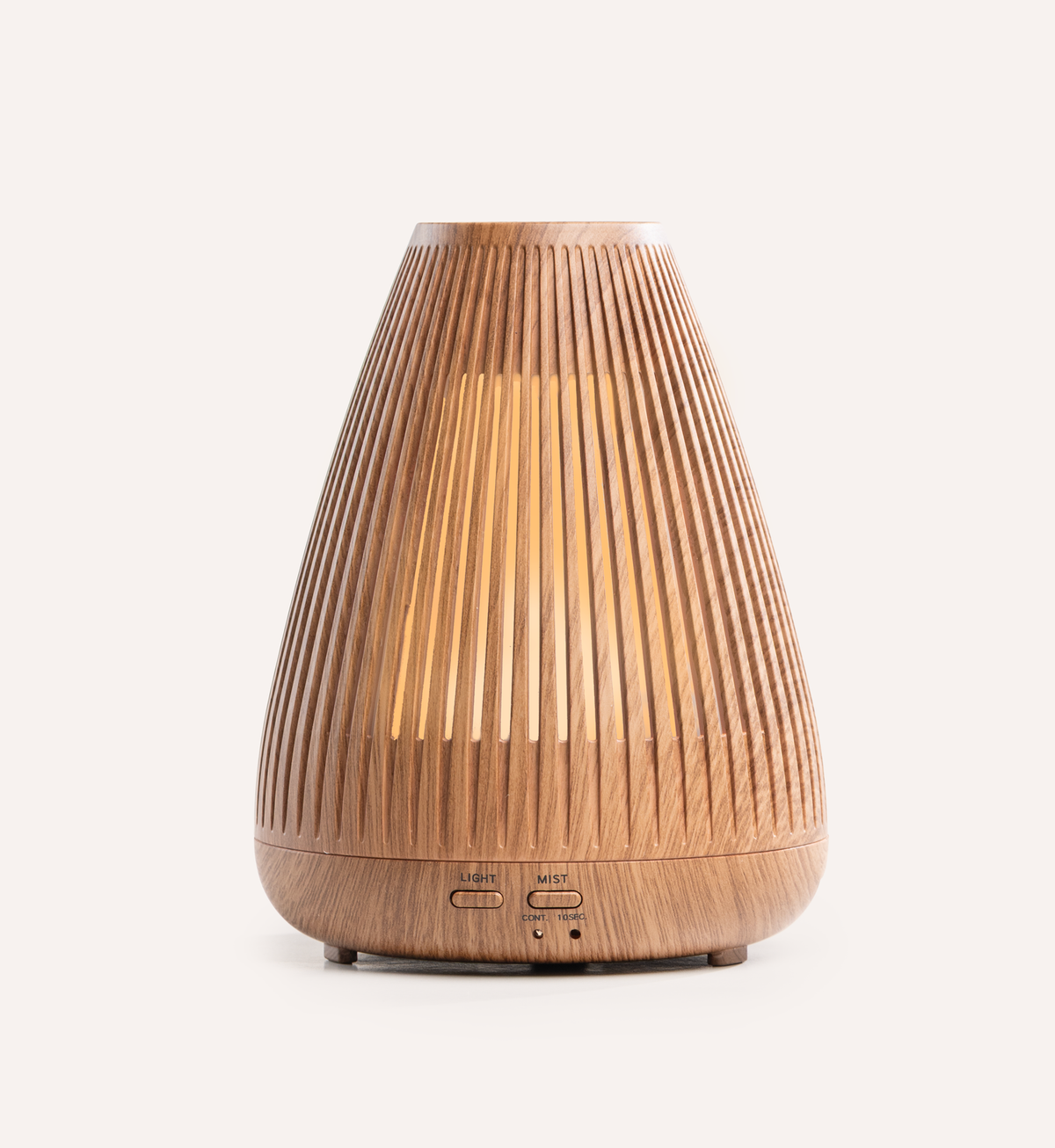 Lively Living Aroma-Flare diffuser in slatted woodgrain with a warm inner glow on a plain cream background