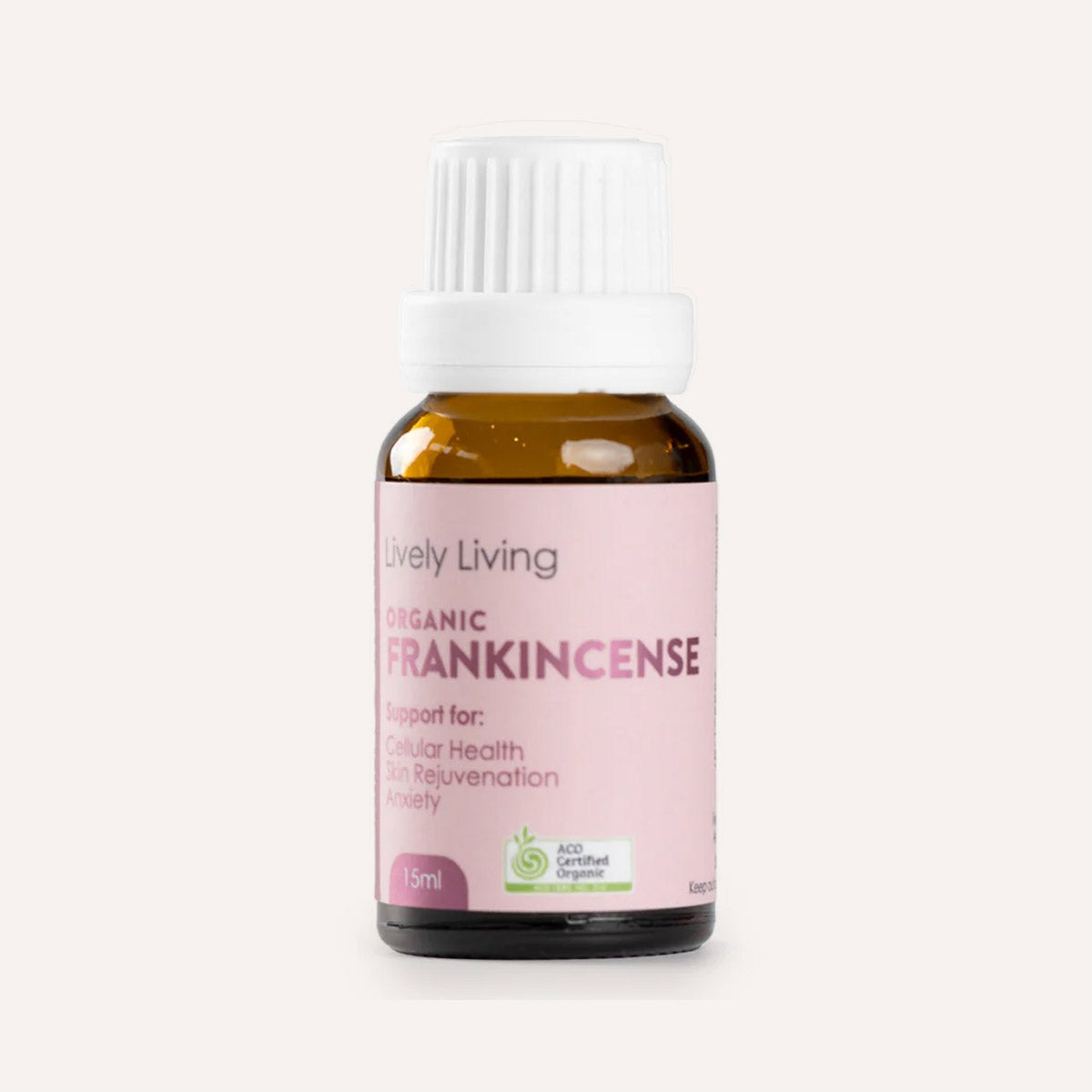 Bottle of Lively Living Organic Frankincense on a white background