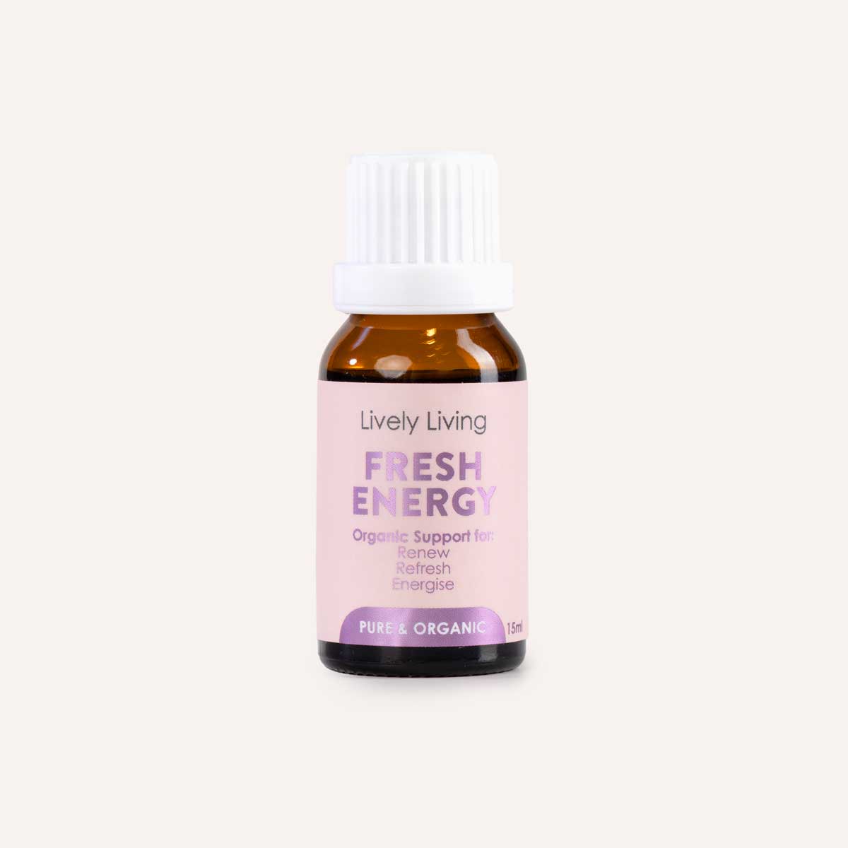 A small amber glass bottle with a white ribbed cap and a pale pink label reading 'Lively Living Fresh Energy Organic Support Formula' on a light beige background.