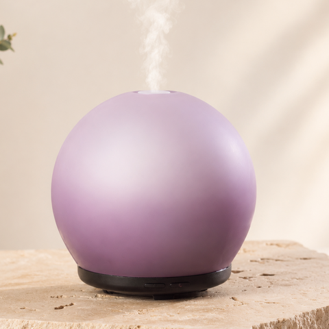 Purple glass diffuser with black base