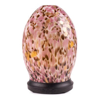 Decorative egg-shaped diffuser with a pink and gold pattern on a white