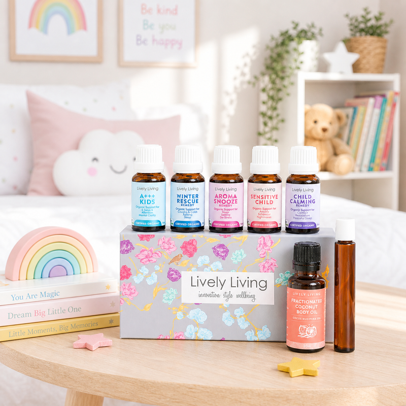 Set of essential oil bottles on a table with a 'Lively Living' box in a child's room.
