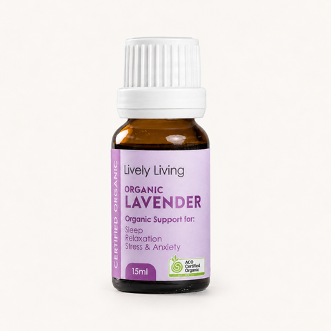 Lively Living Organic Lavender essential oil in a 15ml amber glass bottle with a white cap, lilac label and ACO Certified Organic logo, on a cream background