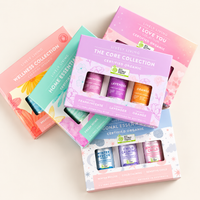 Flat lay of Lively Living gift boxes, with The Core Collection of Frankincense, Lavender and Orange on top and a box of Winter Rescue, Child Calming and Sensitive Child below