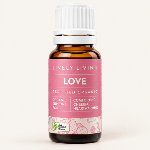 Front view of Lively Living Love certified organic essential oil, 15ml amber bottle with a pink label and ACO Certified Organic logo on a cream background