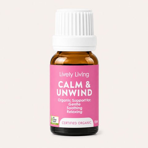 Bottle of Lively Living 'Calm & Unwind' essential oil on a light beige background
