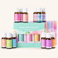 Home Essentials Kit gift box of Fresh Home, Calm and Unwind and Spearmint surrounded by Lively Living certified organic oils