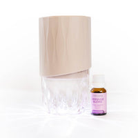 Lively Living Aroma Petal Crystal diffuser with light beige top and crystal base.