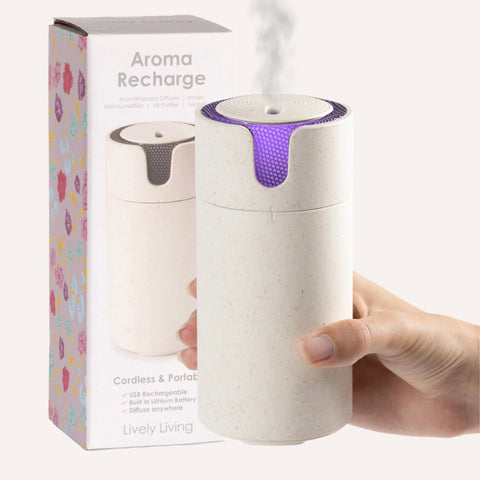 White and purple aroma recharge device with packaging on a white background