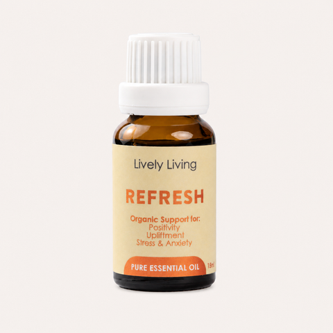 Bottle of Lively Living Refresh essential oil on a white background