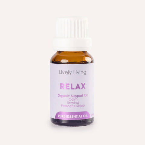 Bottle of Lively Living Relax essential oil on a white background