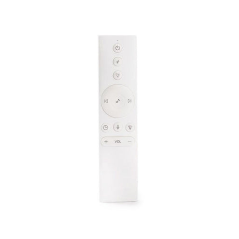 White remote control with various buttons on a white background