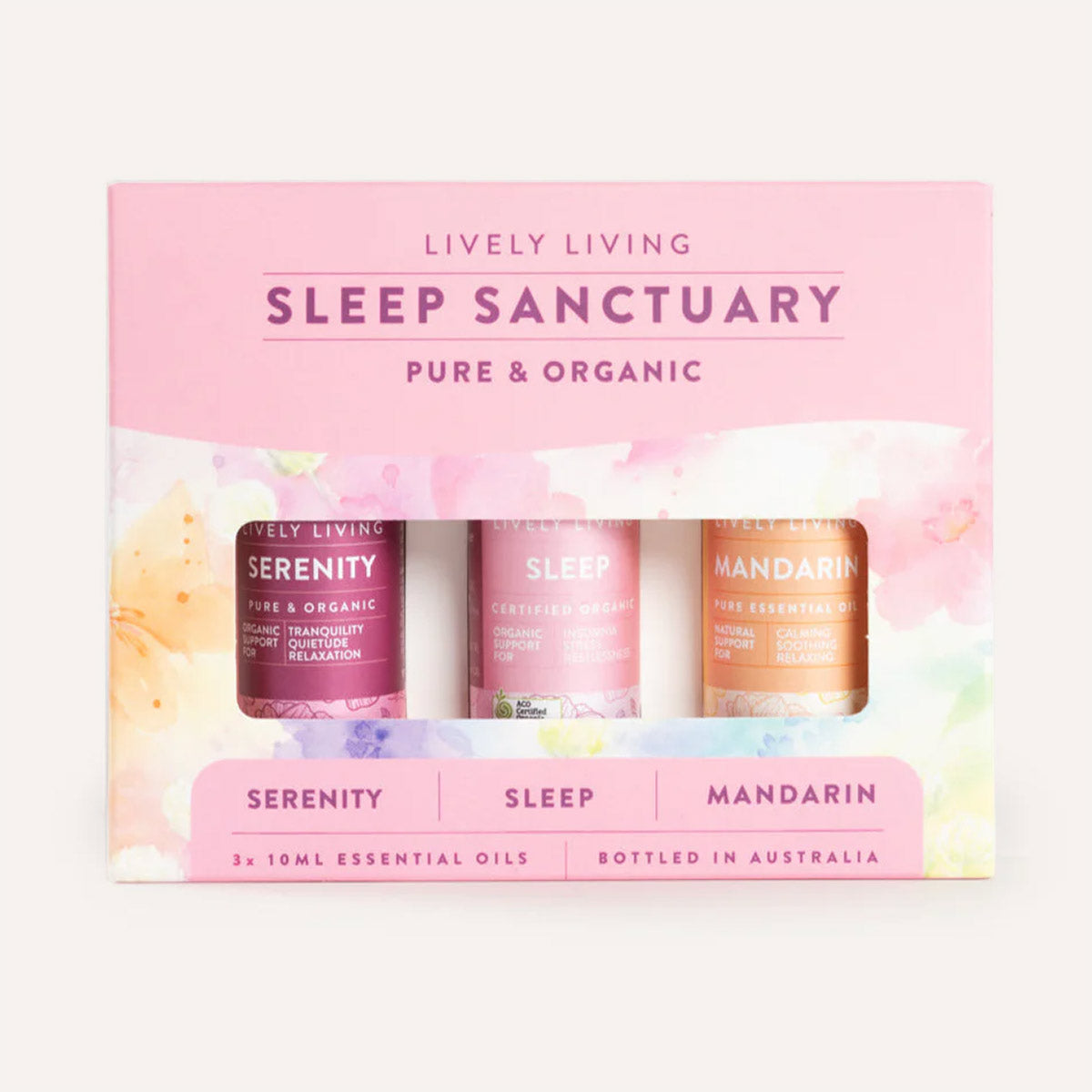 Lively Living Sleep Sanctuary essential oil set with three bottles on a pink background