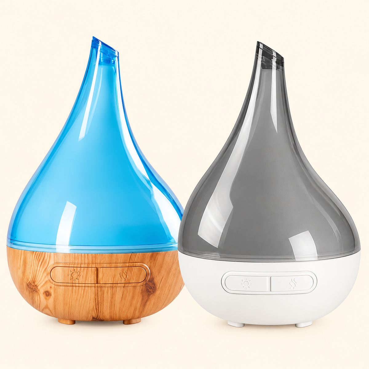 Two Aroma-Bloom teardrop diffusers, one translucent blue with a wood-look base and one translucent grey with a white base, on a cream background