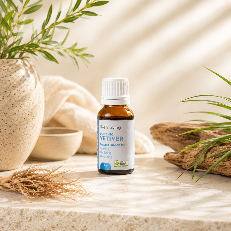 Bottle of Organic Vetiver oil on a neutral background with plants and decor items.