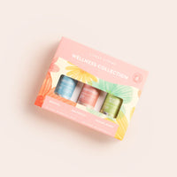Wellness collection gift set with colorful packaging on a light background