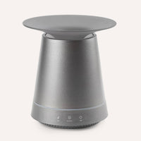 Gray cylindrical diffuser with a round top on a white background