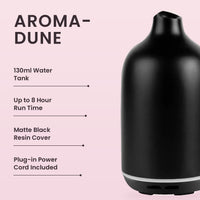 Aroma-Dune Diffuser in Black key features: 130ml water tank, up to 8 hour run time, matte black resin cover, plug-in power cord included