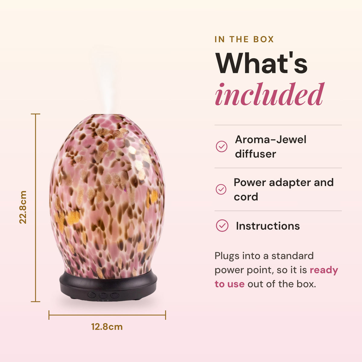 What's included with the Aroma-Jewel diffuser: the speckled pink and amber glass diffuser, power adapter and cord, and instructions, with dimensions of 22.8cm high by 12.8cm wide