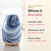Aroma-Swirl blue swirl glass diffuser made for smaller spaces: bedside table, bathroom shelf or home office