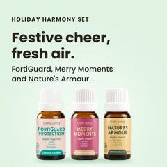 Four bottles of Lively Living essential oils on a white background