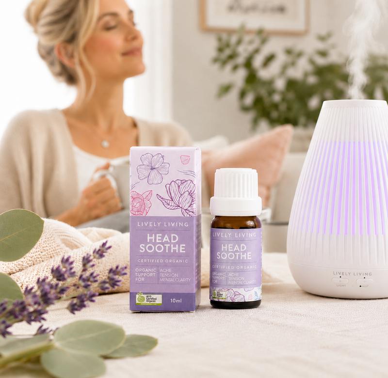 Woman relaxing with Lively Living Head Soothe products on a table.