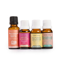 Four bottles of Lively Living essential oils on a white background