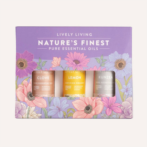 Set of essential oil bottles in a Lively Living branded box with floral design