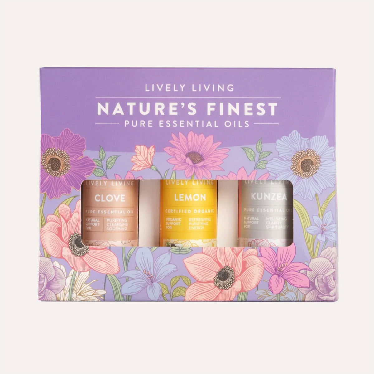 Set of essential oil bottles in a Lively Living branded box with floral design