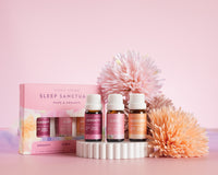 Lively Living Sleep Sanctua product set with flowers on a pink background