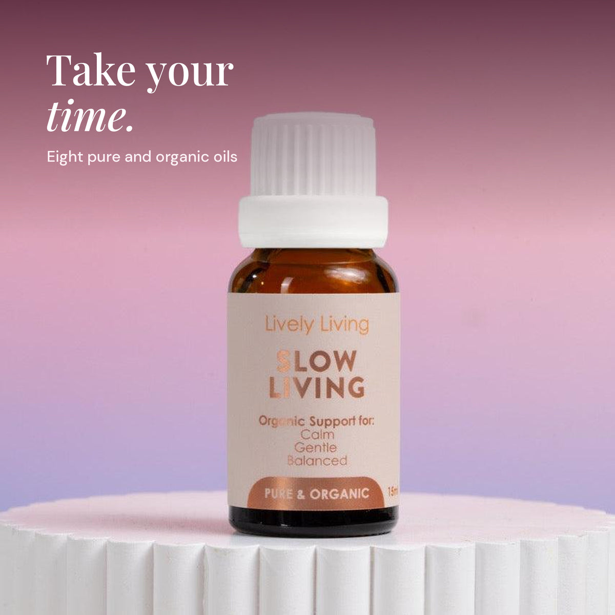 Slow Living 15ml pure and organic essential oil on a white pedestal: take your time