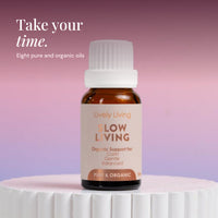 Slow Living 15ml pure and organic essential oil on a white pedestal: take your time