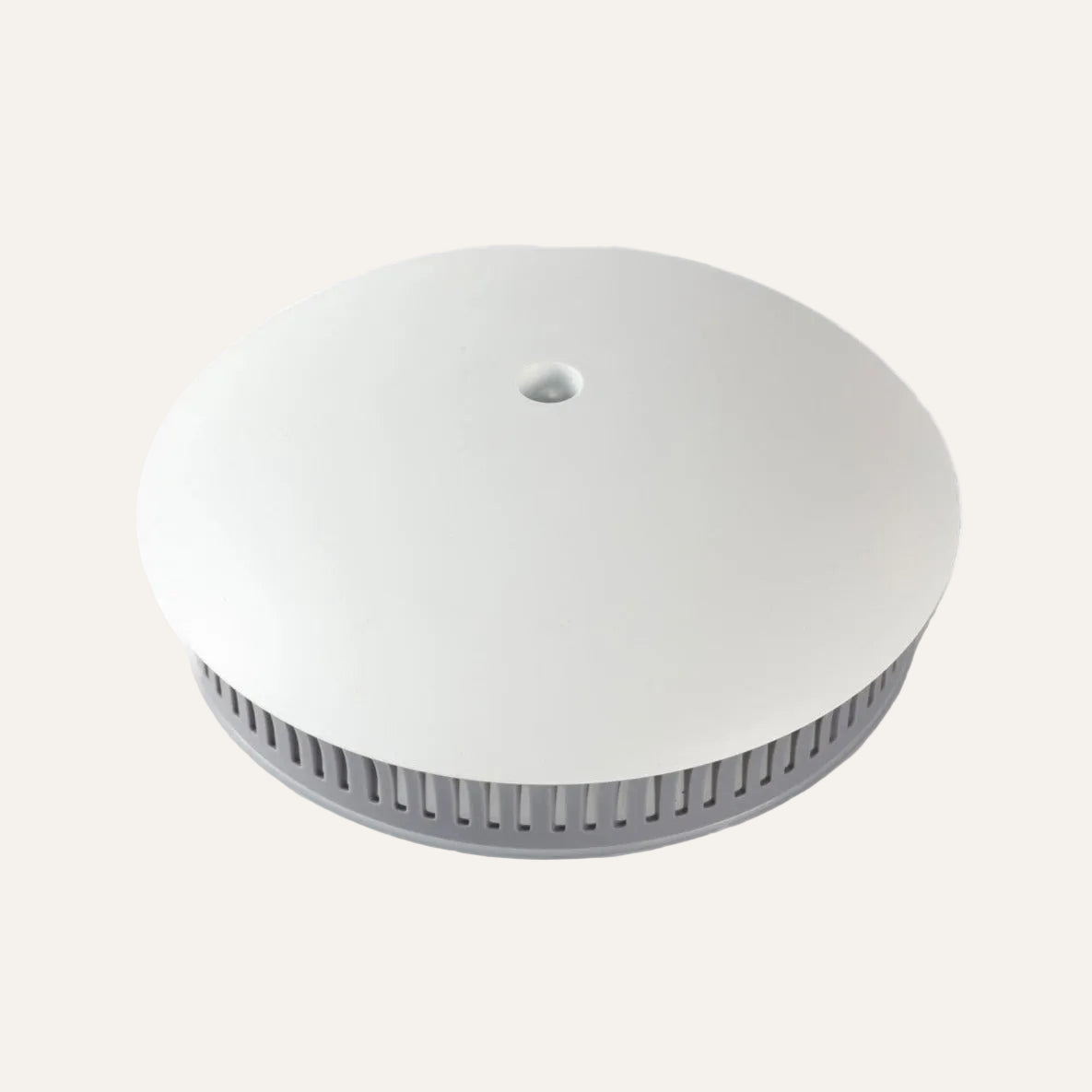 Replacement Aroma-Snooze lid in white with a grey vent ring on a white background