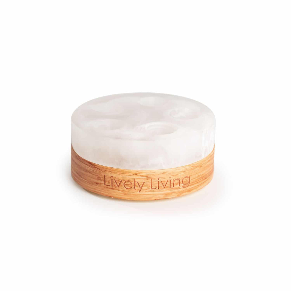 Empty frosted white roll-on stand with a timber base engraved Lively Living